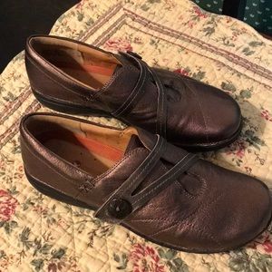 Clark’s bronze metallic women’s shoes.